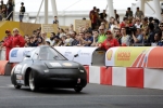 Crowds watch cars racing on the track during Make the Future London 2016 at the Queen Elizabeth Olympic Park, Sunday, July 3, 2016 in London, UK. Today marks the conclusion of the very first Drivers' World Championships, as a head to head race against the 2016 UrbanConcept winners from North America, Asia and Europe to find the quickest and most energy-efficient driver. (Jeff Moore for Shell)